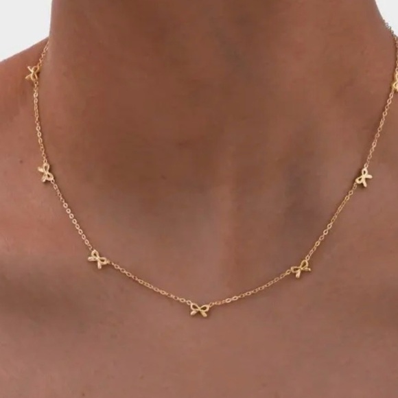 Trendy boutique Jewelry - Gold Dainty Bow Necklace (9714)
